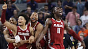 Mar 8, 2025; Auburn, Alabama, USA; Alabama Crimson Tide guard Mark Sears (1) celebrates after making the game winning shot to beat the Auburn Tigers in overtime at Neville Arena.