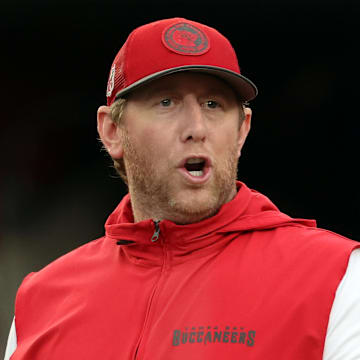 Aug 23, 2024; Tampa, Florida, USA;  Tampa Bay Buccaneers offensive coordinator Liam Coen looks on before the game against the Miami Dolphins at Raymond James Stadium. Mandatory Credit: Kim Klement Neitzel-Imagn Images