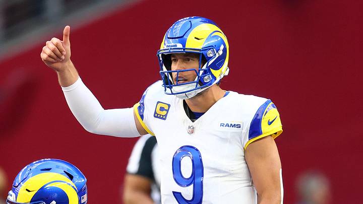 Dec 7, 2025; Glendale, Arizona, USA; Los Angeles Rams quarterback Matthew Stafford (9) reacts against the Arizona Cardinals during the first half at State Farm Stadium. Mandatory Credit: Mark J. Rebilas-Imagn Images