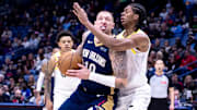 Jan 17, 2025; New Orleans, Louisiana, USA; New Orleans Pelicans center Daniel Theis (10) drives to the basket against Utah Jazz forward Cody Williams (5) during the first half at Smoothie King Center. Mandatory Credit: Stephen Lew-Imagn Images