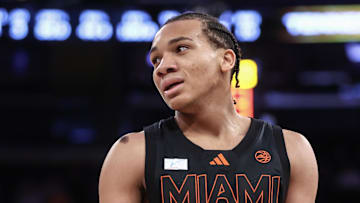 Dec 10, 2024; New York, New York, USA;  Miami Hurricanes guard Divine Ugochukwu (99) looks to the bench after committing a foul in the first half against the Tennessee Volunteers at Madison Square Garden. Mandatory Credit: Wendell Cruz-Imagn Images