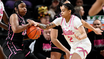 Mississippi State guard Jerkaila Jordan (2) slaps the away from Vanderbilt guard Jordyn Oliver (11) during an NCAA college basketball game Thursday, Feb. 13, 2025, in Nashville, Tenn.