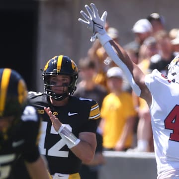 Iowa’s Cade McNamara (12) throws Illinois State Saturday, Aug. 31, 2024 at Kinnick Stadium in Iowa City, Iowa.