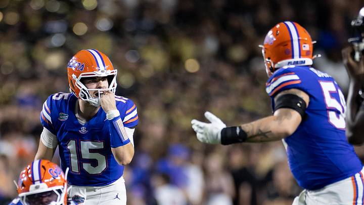 Oct 5, 2024; Gainesville, Florida, USA; Florida Gators quarterback Graham Mertz (15) calls a play to Florida Gators offensive lineman Austin Barber (58) during the first half at Ben Hill Griffin Stadium. Mandatory Credit: Matt Pendleton-Imagn Images