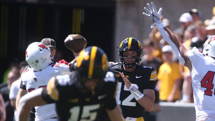 Iowa’s Cade McNamara (12) throws Illinois State Saturday, Aug. 31, 2024 at Kinnick Stadium in Iowa City, Iowa.