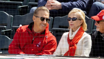 Mar 16, 2021; Tempe, Arizona, USA; Los Angeles Angels owner Arte Moreno (left) with wife Carole