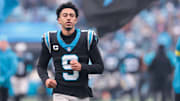 Nov 30, 2025; Charlotte, North Carolina, USA; Carolina Panthers quarterback Bryce Young (9) takes the field before the game against the Los Angeles Rams at Bank of America Stadium. 