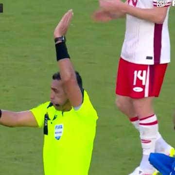 The referee in Curacao-Canada disallows a goal.