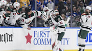 Oct 15, 2024; St. Louis, Missouri, USA; Minnesota Wild goaltender Filip Gustavsson (32) celebrates with goaltender Marc-Andre Fleury (29) after scoring a goal against the St. Louis Blues during the third period at Enterprise Center. Mandatory Credit: Jeff Le-Imagn Images