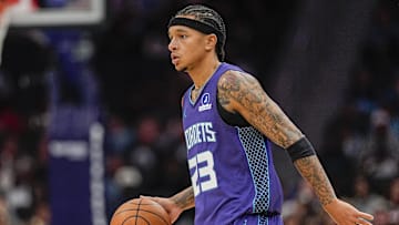 Nov 2, 2025; Charlotte, North Carolina, USA; Charlotte Hornets guard Tre Mann (23) handles the ball against the Utah Jazz during the first quarter at Spectrum Center. Mandatory Credit: Jim Dedmon-Imagn Images