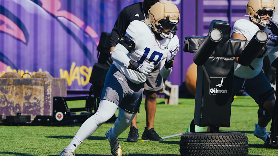 Caleb Smith makes a move during a UW spring drill.  