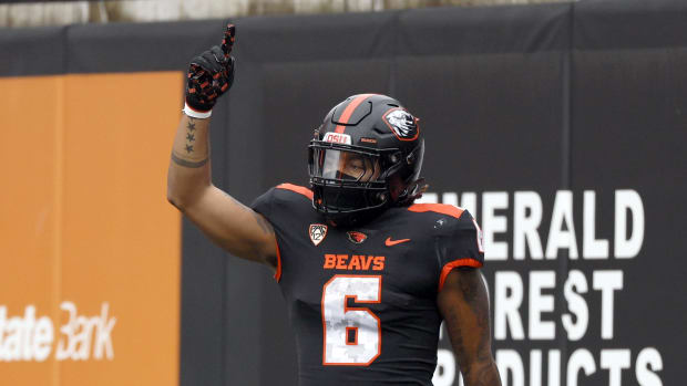 Oregon State Beavers running back Damien Martinez (6) celebrates after scoring a touchdown during the first half against the 