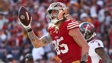 Nov 10, 2024; Tampa, Florida, USA; San Francisco 49ers tight end George Kittle (85) celebrates after scoring a touchdown against the Tampa Bay Buccaneers in the fourth quarter at Raymond James Stadium. Mandatory Credit: Nathan Ray Seebeck-Imagn Images