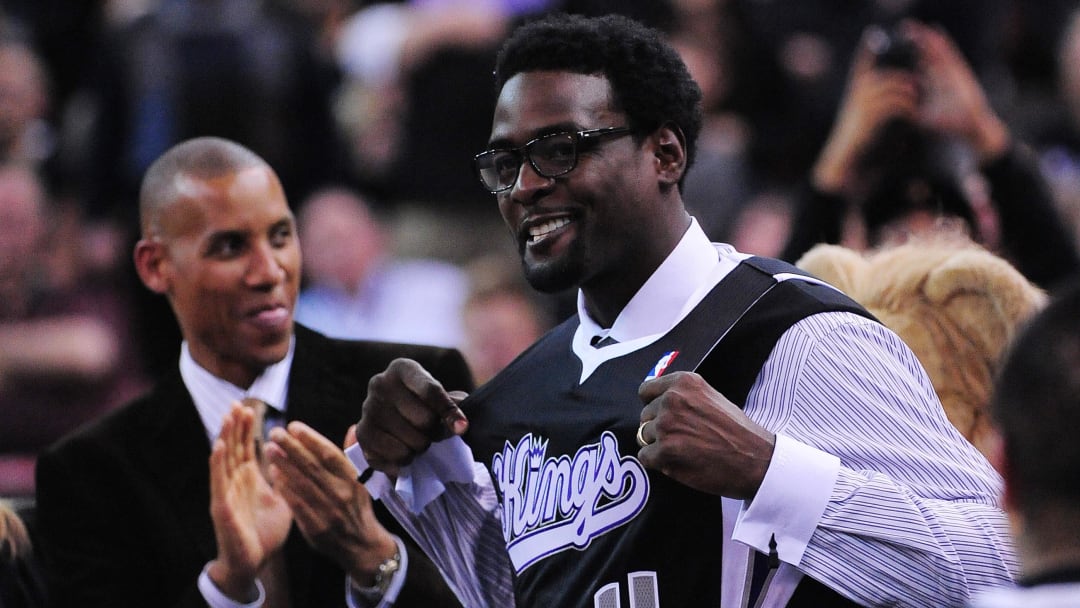 February 9, 2012; Sacramento, CA, USA; Sacramento Kings former player Chris Webber (right) holds his jersey as former Indiana Pacers player Reggie Miller (left) looks on during the first quarter against the Oklahoma City Thunder at Power Balance Pavilion. Mandatory Credit: Kyle Terada-USA TODAY Sports