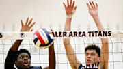Shaler sophomore middle blocker Brandon Aryee, left, and senior outside hitter Jacob Crissman, right,  put up a block during Shaler's win over North Hills Monday night.