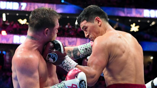 Dmitry Bivol lands a left hook on Canelo Alvarez