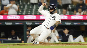 Jun 24, 2025; Detroit, Michigan, USA; Detroit Tigers outfielder Javier Baez (28) scores a run in the eighth inning against the Athletics at Comerica Park. Mandatory Credit: Rick Osentoski-Imagn Images