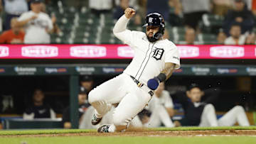 Jun 24, 2025; Detroit, Michigan, USA; Detroit Tigers outfielder Javier Baez (28) scores a run in the eighth inning against the Athletics at Comerica Park. Mandatory Credit: Rick Osentoski-Imagn Images