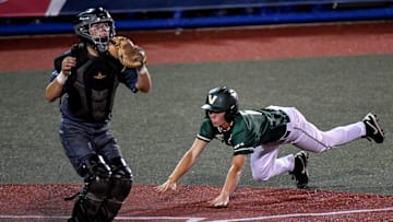 Aiden Cameron of Viera scores against Heritage in last year's district semifinals. Last week, he went 4-for-4 with a double, two runs scored and one RBI to rally the Hawks past Palm Beach Gardens Dwyer, 9-7, in Game 3 of their Class 6A first-round series.