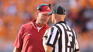Oct 19, 2024; Knoxville, Tennessee, USA; Alabama Crimson Tide head coach Kalen DeBoer speaks with an official during the first quarter against the Tennessee Volunteers at Neyland Stadium. Mandatory Credit: Randy Sartin-Imagn Images