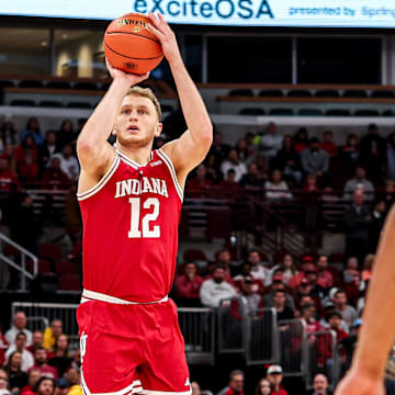 Indiana senior forward Tucker DeVries attempts a jump shot Nov. 9, 2025, against Marquette at the United Center in Chicago.