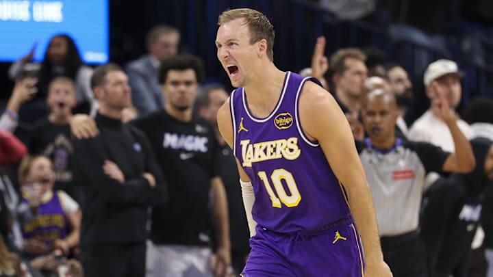 Mar 21, 2026; Orlando, Florida, USA; Los Angeles Lakers guard Luke Kennard (10) reacts after hitting a game winning basket at the buzzer against the Orlando Magic in the fourth quarter at Kia Center. Mandatory Credit: Nathan Ray Seebeck-Imagn Images