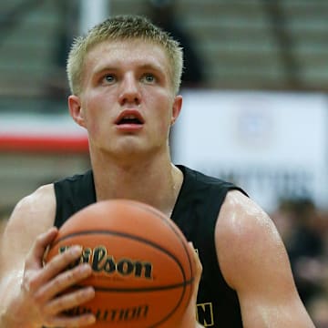 Mt. Vernon's Luke Ertel (12) at the free throw line in the IHSAA Class 4A Boys Basketball Southport Regional, Mar 15, 2025.