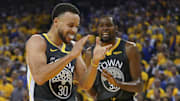 April 30, 2019; Oakland, CA, USA; Golden State Warriors guard Stephen Curry (30) and forward Kevin Durant (35) react against the Houston Rockets during the second quarter in game two of the second round of the 2019 NBA Playoffs at Oracle Arena. Mandatory Credit: Kyle Terada-Imagn Images