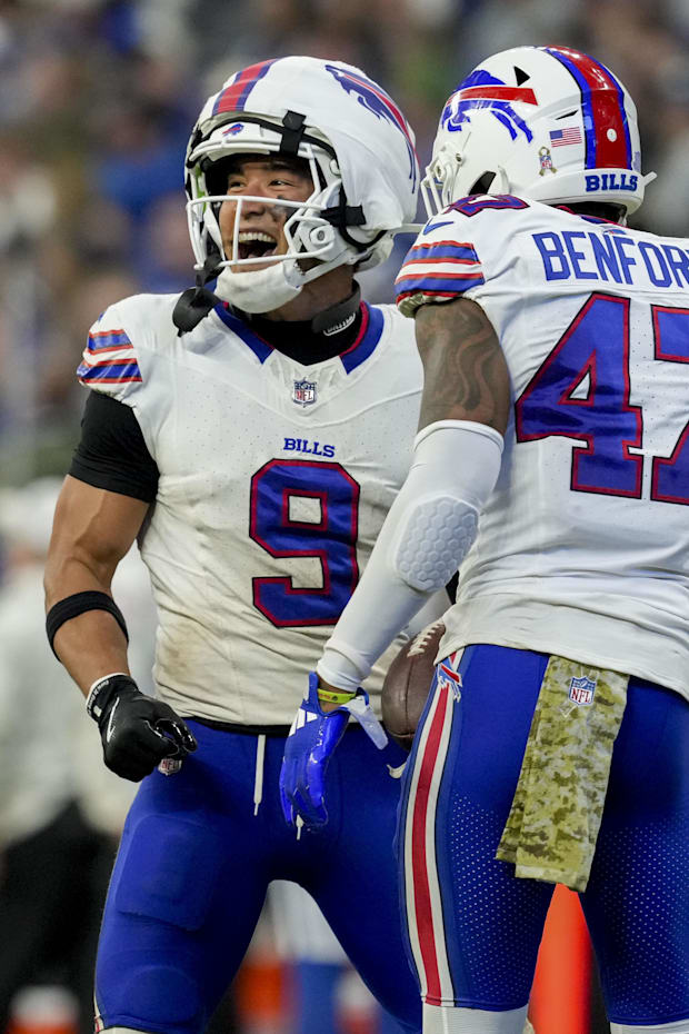 Buffalo Bills safety Taylor Rapp celebrates after making an interception during a game against the Indianapolis Colts