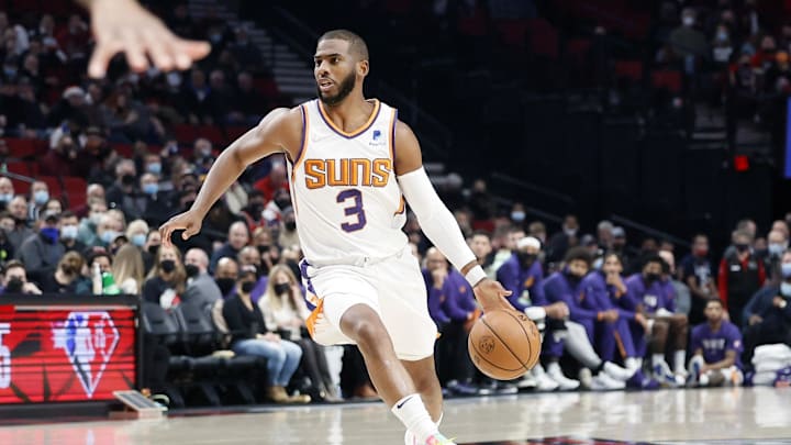 Phoenix Suns point guard Chris Paul dribbles the ball during the first half against the Portland Trail Blazers. Phoenix Suns point guard Chris Paul dribbles the ball during the first half against the Portland Trail Blazers.