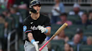 Aug 8, 2025; Cumberland, Georgia, USA; Miami Marlins left fielder Kyle Stowers (28) walks and tosses his bat against the Atlanta Braves during the fifth inning at Truist Park.