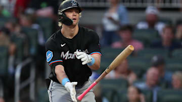 Aug 8, 2025; Cumberland, Georgia, USA; Miami Marlins left fielder Kyle Stowers (28) walks and tosses his bat against the Atlanta Braves during the fifth inning at Truist Park