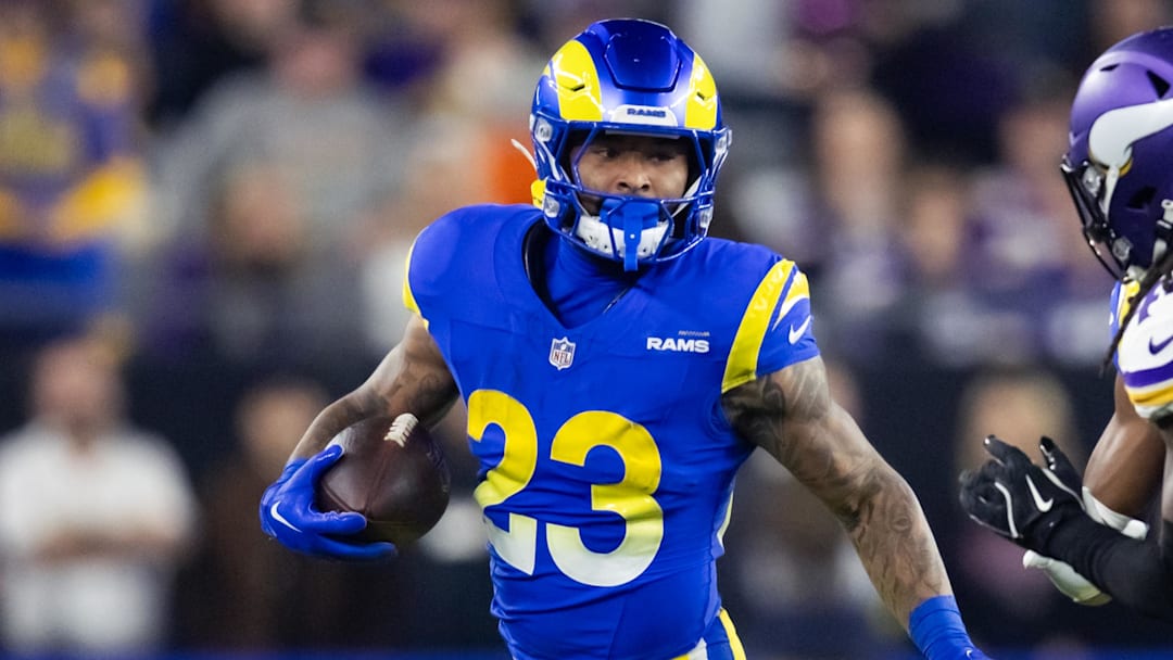 Jan 13, 2025; Glendale, AZ, USA; Los Angeles Rams running back Kyren Williams (23) against the Minnesota Vikings during an NFC wild card game at State Farm Stadium. Mandatory Credit: Mark J. Rebilas-Imagn Images