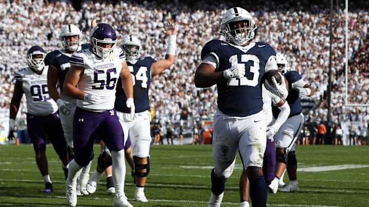 Penn State Nittany Lions running back Kaytron Allen (13) runs the ball into the end zone for a touchdown during the second quarter against the Northwestern Wildcats at Beaver Stadium.