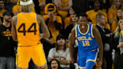 UCLA Bruins guard Sebastian Mack (12) reacts after a basket against Arizona State during the second half at Desert Financial Arena in Tempe on Jan. 17, 2024.