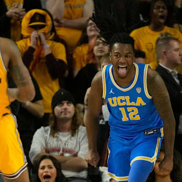 UCLA Bruins guard Sebastian Mack (12) reacts after a basket against Arizona State during the second half at Desert Financial Arena in Tempe on Jan. 17, 2024.