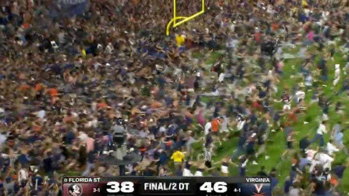 Virginia fans descended upon the field in a terrifying swarm after the Cavaliers upset the Seminoles on Friday night. Virginia fans descended upon the field in a terrifying swarm after the Cavaliers upset the Seminoles on Friday night.