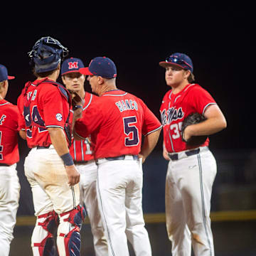 Ole Miss baseball coach Mike Bianco heads to the mound to change pitchers again after Mississippi State scored four runs in the eighth inning at Trustmark Perk in Pearl, Miss., Wednesday, May 1, 2024.