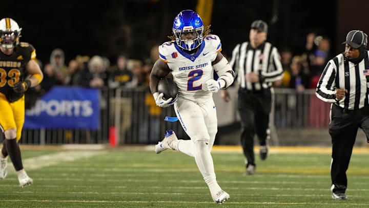 Ashton Jeanty runs the ball during No. 12 Boise State's 17–13 win over Wyoming on Nov. 23, 2024.