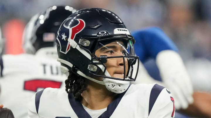 Houston Texans quarterback C.J. Stroud (7) draws back to pass Saturday, Jan. 6, 2024, during a game against the Houston Texans at Lucas Oil Stadium in Indianapolis.