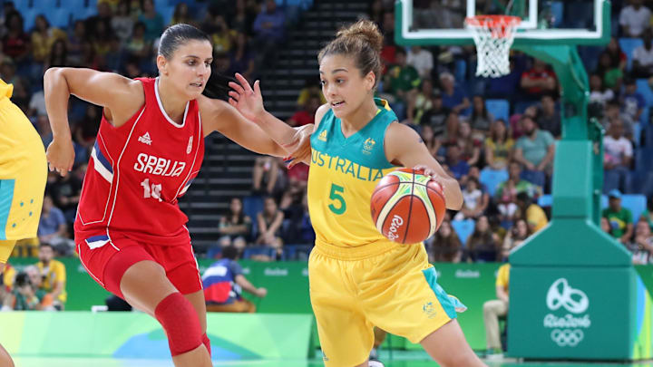 Aug 16, 2016; Rio de Janeiro, Brazil; Australia point guard Leilani Mitchell (5) drives around Serbia shooting guard Dajana Butulija (10) in a women's quarterfinal basketball game at Carioca Arena 1 during the Rio 2016 Summer Olympic Games. Mandatory Credit: Geoff Burke-Imagn Images