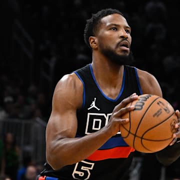 Dec 12, 2024; Boston, Massachusetts, USA;  Detroit Pistons guard Malik Beasley (5) shoots the ball against the Boston Celtics during the first half at TD Garden. Mandatory Credit: Eric Canha-Imagn Images