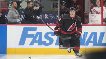 May 28, 2025; Raleigh, North Carolina, USA; Carolina Hurricanes defenseman Scott Morrow (56) enters the ice for warm up prior to the first period against the Florida Panthers in game five of the Eastern Conference Final of the 2025 Stanley Cup Playoffs at Lenovo Center. Mandatory Credit: James Guillory-Imagn Images