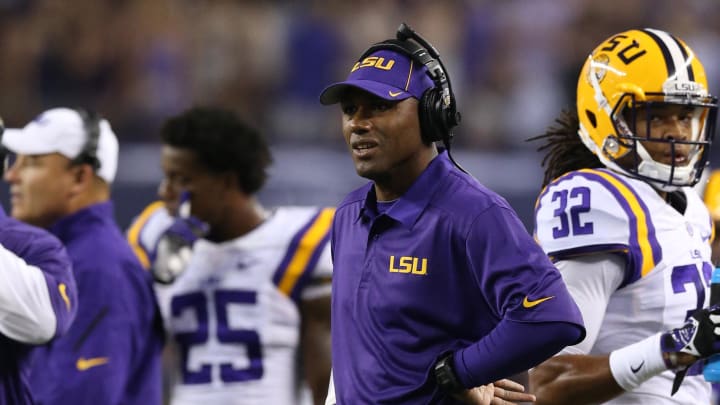 Aug 31, 2013; Arlington, TX, USA; LSU Tigers defensive backs coach Corey Raymond on the sidelines during the game against the Texas Christian Horned Frogs at AT&T Stadium. Mandatory Credit: Matthew Emmons-USA TODAY Sports