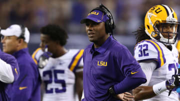Aug 31, 2013; Arlington, TX, USA; LSU Tigers defensive backs coach Corey Raymond on the sidelines during the game against the Texas Christian Horned Frogs at AT&T Stadium. Mandatory Credit: Matthew Emmons-USA TODAY Sports