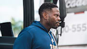 Kenechi Udeze walking out of the bus for Panther Walk