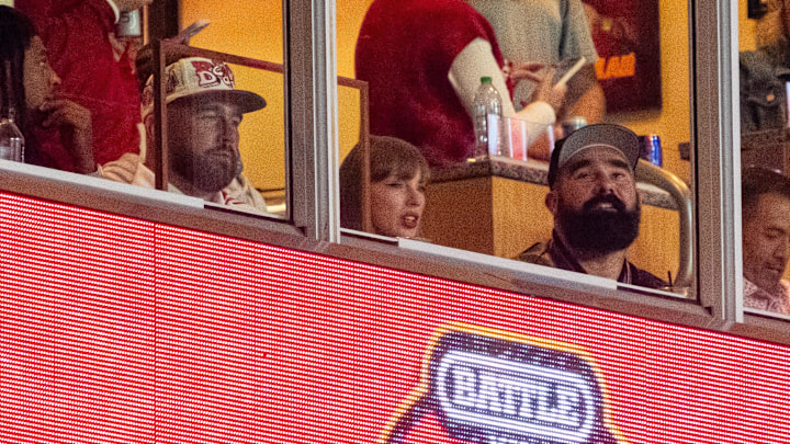 Travis Kelce, Taylor Swift, and Jason Kelce watch during the second quarter between the Cincinnati Bearcats and Nebraska. Travis Kelce, Taylor Swift, and Jason Kelce watch during the second quarter between the Cincinnati Bearcats and Nebraska.