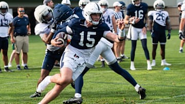 Penn State quarterback Drew Allar (15) runs with the ball during practice outside Holuba Hall on Saturday, August 2, 2025, in State College