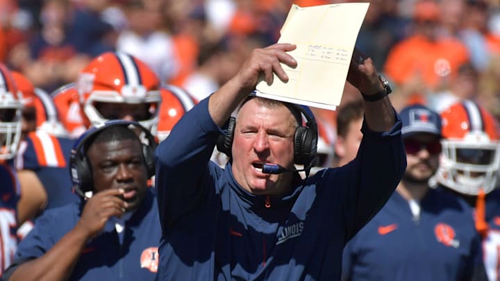 Sep 27, 2025; Champaign, Illinois, USA;  Illinois Fighting Illini head coach Bret Bielema calls a time out during the first half against the Southern California Trojans at Memorial Stadium. Mandatory Credit: Ron Johnson-Imagn Images