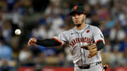 Jul 23, 2024; Los Angeles, California, USA; San Francisco Giants second baseman Thairo Estrada (39) throws to first for an out during the fifth inning against the Los Angeles Dodgers at Dodger Stadium. Mandatory Credit: Jason Parkhurst-USA TODAY Sports